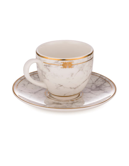 Cup and saucer in white background